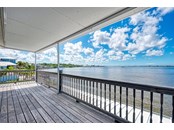 Balcony with majestic Lemon Bay views - Single Family Home for sale at 949 Suncrest Ln, Englewood, FL 34223 - MLS Number is D6120396