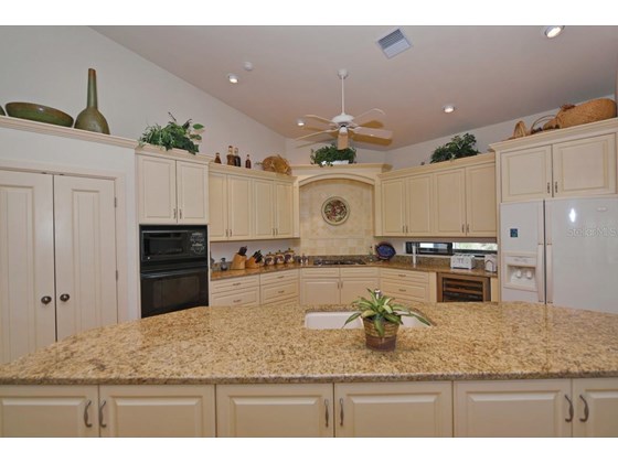 Kitchen 1 - Single Family Home for sale at 631 Bocilla Dr, Placida, FL 33946 - MLS Number is D6122145
