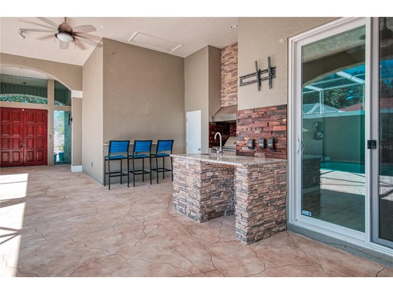 custom outdoor kitchen - Single Family Home for sale at 345 7th Ave N, Tierra Verde, FL 33715 - MLS Number is U8135988
