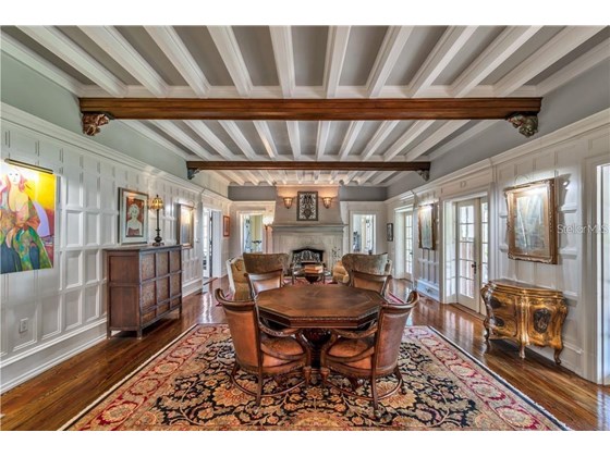 A coffered ceiling and regal room for captivating conversations - Single Family Home for sale at 5030 Sunrise Dr S, St Petersburg, FL 33705 - MLS Number is U8146766