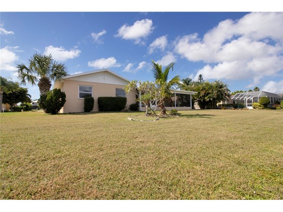 Rear View From Water - Single Family Home for sale at 120 Sinclair St Sw, Port Charlotte, FL 33952 - MLS Number is C7450500