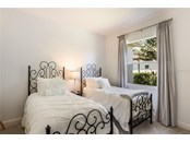 Bedroom #2 - Single Family Home for sale at 3501 Founders Club Dr, Sarasota, FL 34240 - MLS Number is A4497661