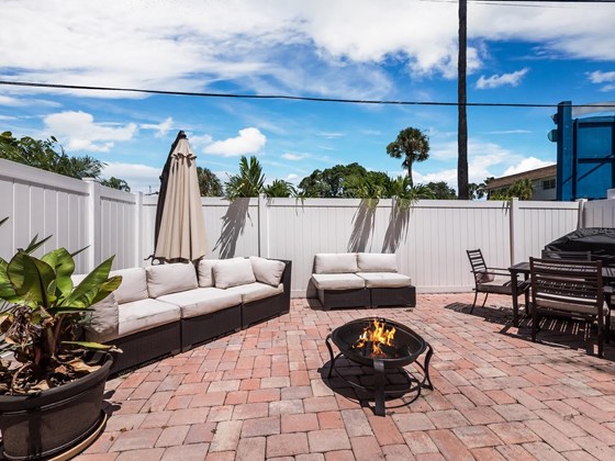 Patio living extended off the first floor efficiency. - Condo for sale at 6810 Midnight Pass Rd, Sarasota, FL 34242 - MLS Number is A4507853