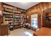 Library/den with built-in book cases - Single Family Home for sale at 7700 Iguana Dr, Sarasota, FL 34241 - MLS Number is A4512842