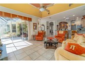 Large triple glass disappearing doors bring the outdoors in. Even if you're not out using the pool or Lanai but dining indoors, it is much more visually appealing. - Single Family Home for sale at 6521 Sundew Ct, Lakewood Ranch, FL 34202 - MLS Number is A4514104