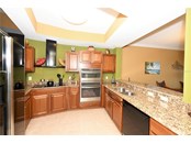 Wide Open kitchen with water view! - Condo for sale at 516 Tamiami Trl S #405, Nokomis, FL 34275 - MLS Number is A4517408