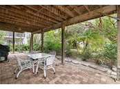 Ground level covered patio - Single Family Home for sale at 231 64th St, Holmes Beach, FL 34217 - MLS Number is A4518052