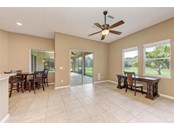 Family Room w/ breakfast nook - Single Family Home for sale at 348 165th Ct Ne, Bradenton, FL 34212 - MLS Number is A4522009