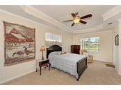 Master Suite with dual walk-in closets - Single Family Home for sale at 314 Lake Tahoe Ct, Englewood, FL 34223 - MLS Number is N6117592